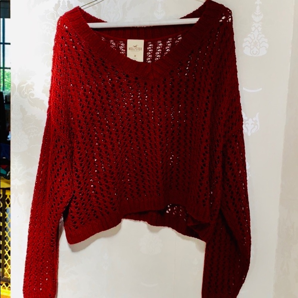 Crocheted sweater (color red) has not been used